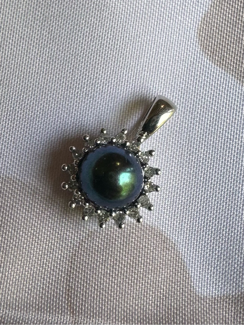 White Gold Pendant with Iridescent Black Pearl and Diamond Halo Accents